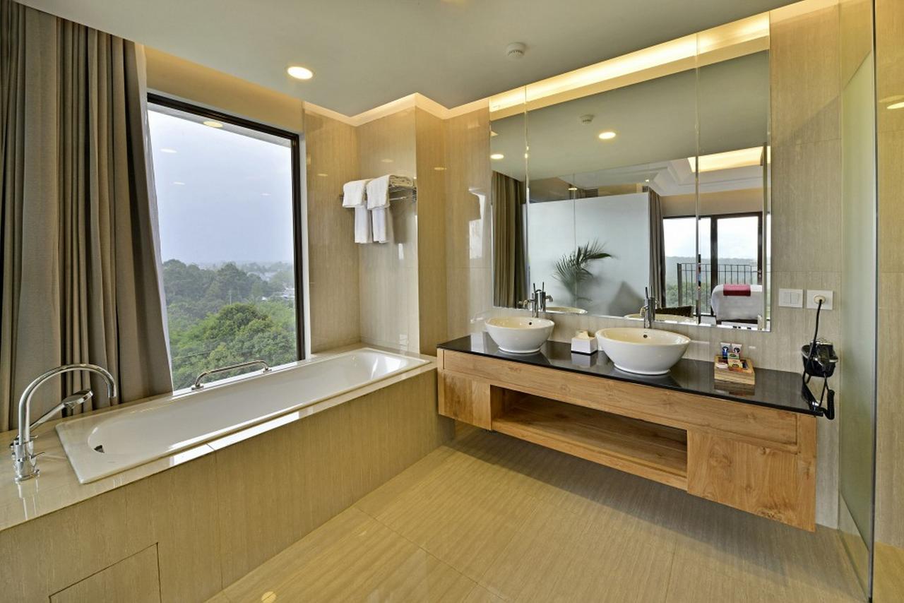 Famvida Hotel Lubuklinggau Phòng bức ảnh
